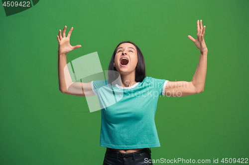 Image of Winning success woman happy ecstatic celebrating being a winner. Dynamic energetic image of female model