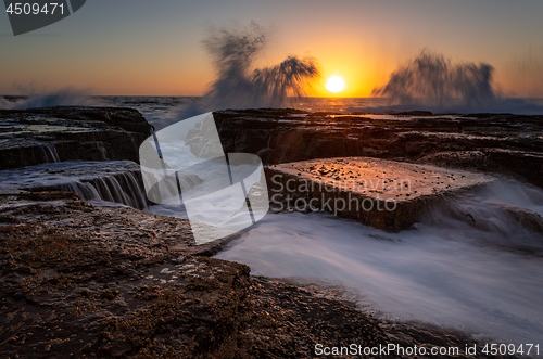 Image of North Narrabeen coastal sunrise with wave splash