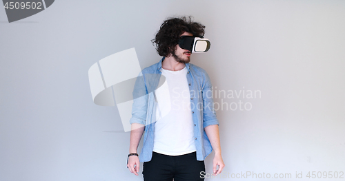 Image of Man using headset of virtual reality