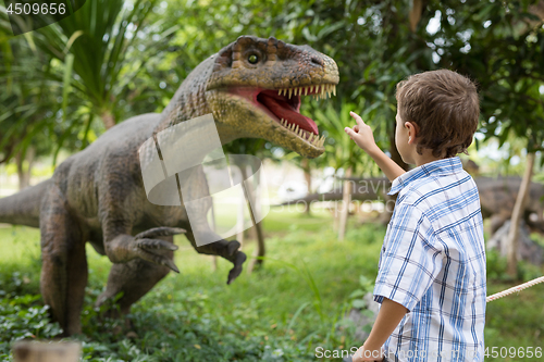 Image of little boy playing in the adventure dino park.