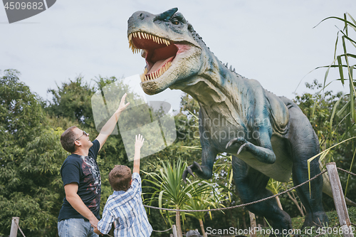 Image of Father and son playing in the adventure dino park.