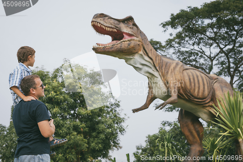 Image of Father and son playing in the adventure dino park.