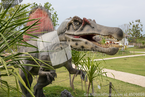 Image of prehistoric era dinosaur. Adventure park.
