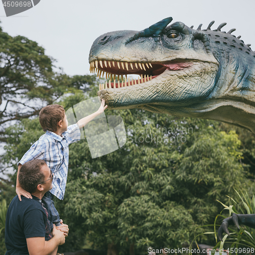 Image of Father and son playing in the adventure dino park.