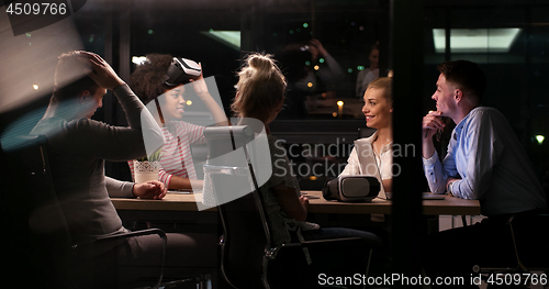 Image of Multiethnic Business team using virtual reality headset