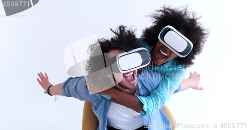 Image of multiethnic couple getting experience using VR headset glasses