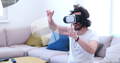 Image of man using VR-headset glasses of virtual reality