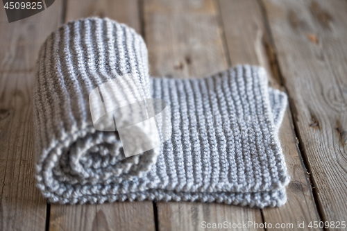 Image of Hand knitted grey scarf.