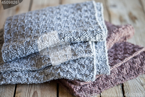 Image of Knitted woolen grey and brown scarves