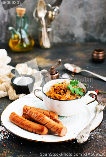 Image of sausages with cabbage