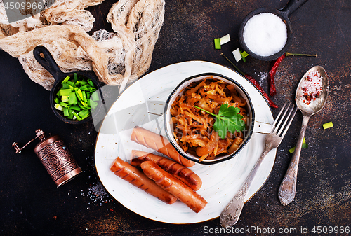 Image of sausages with cabbage