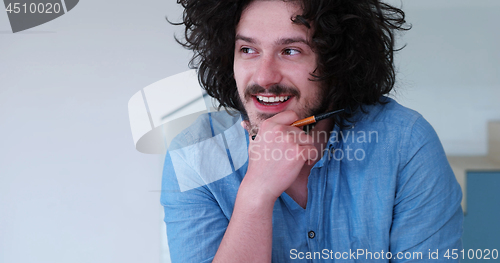 Image of Portrait of a young man enjoying free time