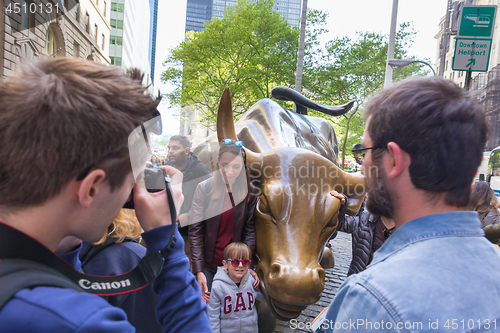 Image of The landmark Charging Bull in Lower Manhattan represents the strength and power of the American People in New York, USA, on 18th of May, 2018.