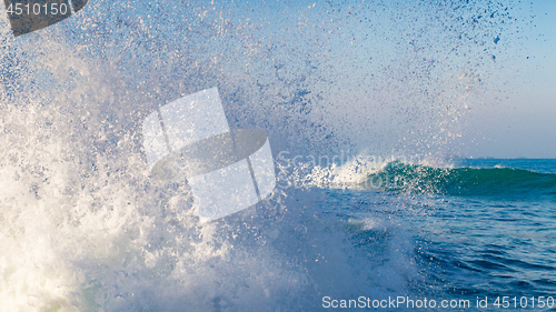 Image of splashing wave near the coast