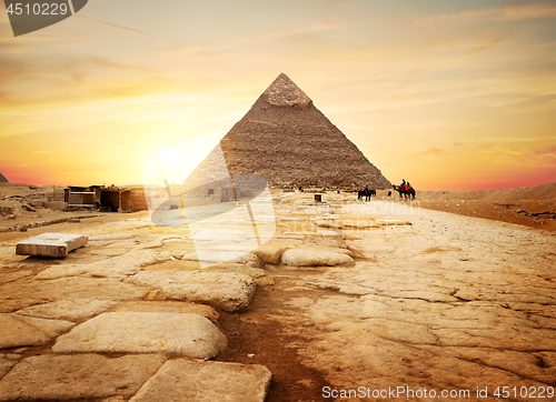 Image of Egyptian pyramid in sand