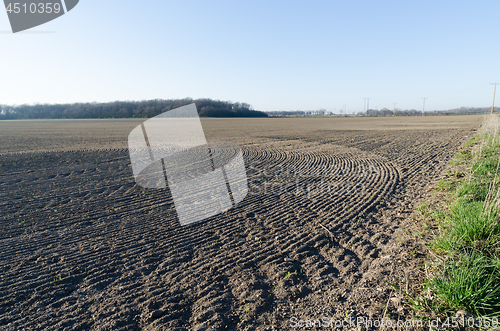 Image of Farmers field just sown by early spring season