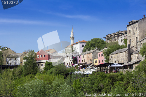 Image of Mostar with the Old Bridge houses and minarets in Bosnia and Her