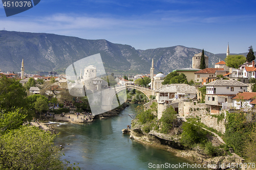 Image of Mostar with the Old Bridge houses and minarets in Bosnia and Her