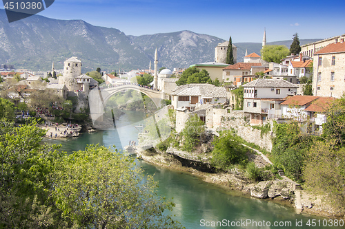 Image of Mostar with the Old Bridge houses and minarets in Bosnia and Her