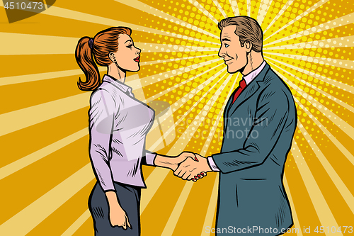 Image of businessman and businesswoman handshake