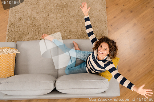 Image of Happy woman at home