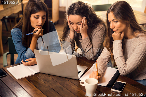 Image of Female friends worried with final exams