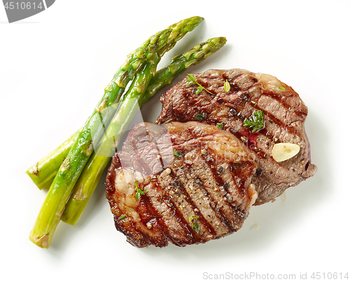Image of grilled steaks on white background