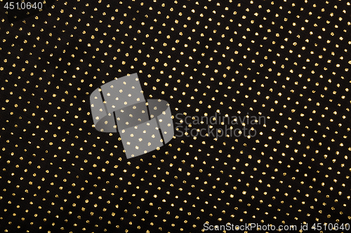 Image of Black textile with golden metallic dots decor