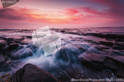 Image of Sunrise at the tessellated rocks of Garie Beach Australia