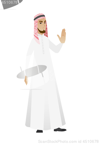 Image of Muslim businessman showing palm hand.