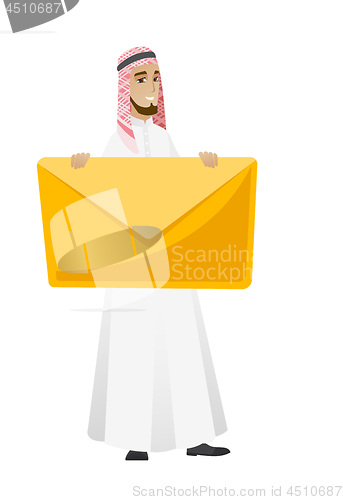 Image of Smiling businessman holding a big envelope.