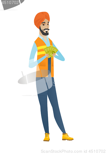 Image of Happy hindu builder holding money.