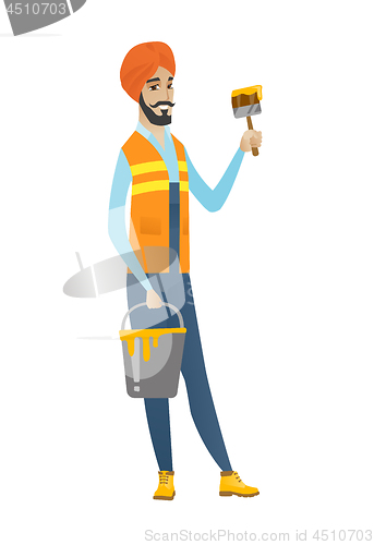 Image of Hindu house painter with brush and bucket of paint