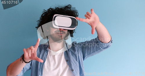Image of man using VR headset glasses of virtual reality