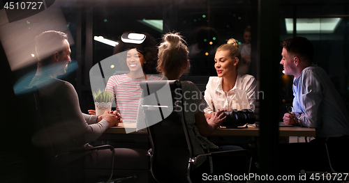 Image of Multiethnic Business team using virtual reality headset