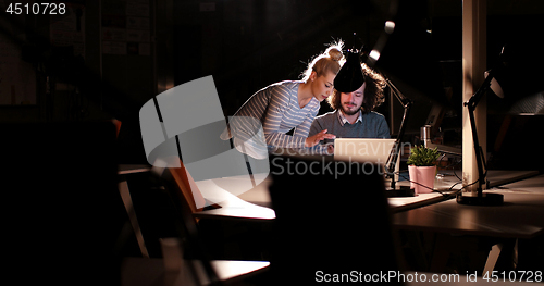 Image of young designers in the night office