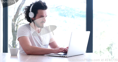 Image of man drinking coffee enjoying relaxing lifestyle