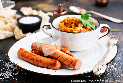 Image of sausages with cabbage