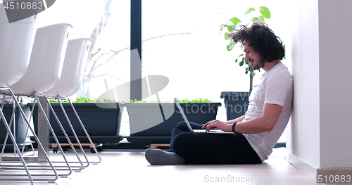 Image of man drinking coffee enjoying relaxing lifestyle