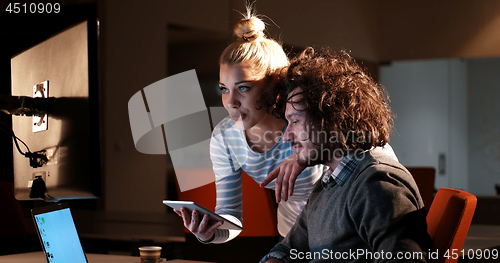 Image of young designers in the night office