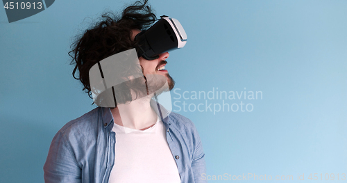 Image of man using VR headset glasses of virtual reality