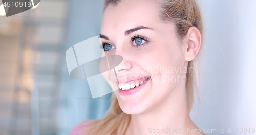 Image of portrait of a beautiful young blond woman