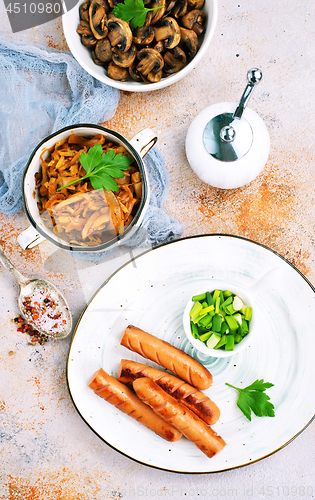 Image of sausages with cabbage