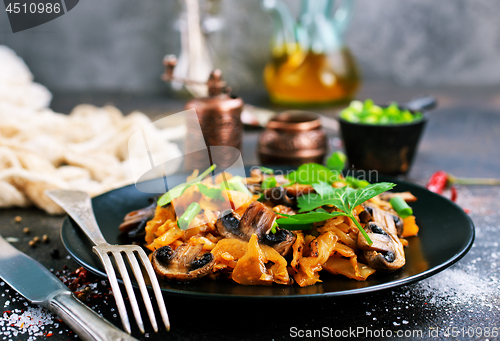 Image of Fried mushrooms and cabbage