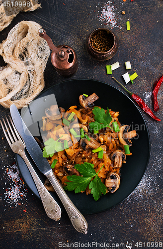 Image of Fried mushrooms and cabbage