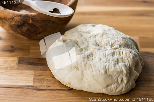 Image of Fresh yeast dough for bread, pizza and baguettes