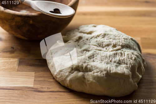 Image of Fresh yeast dough for bread, pizza and baguettes