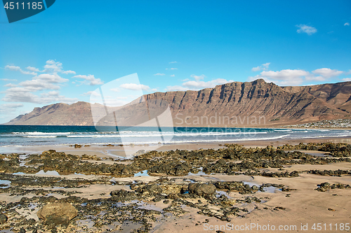 Image of Landscape with volcanic hills and atlantic ocean in Lanzarote 