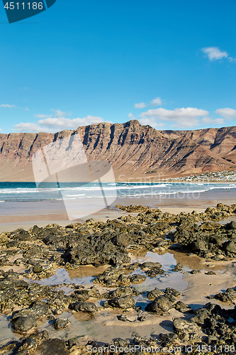 Image of Landscape with volcanic hills and atlantic ocean in Lanzarote 