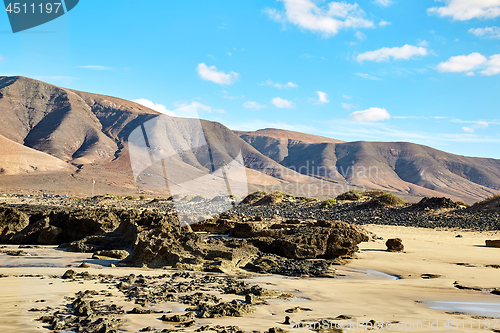 Image of Volcanic hills and blue sky